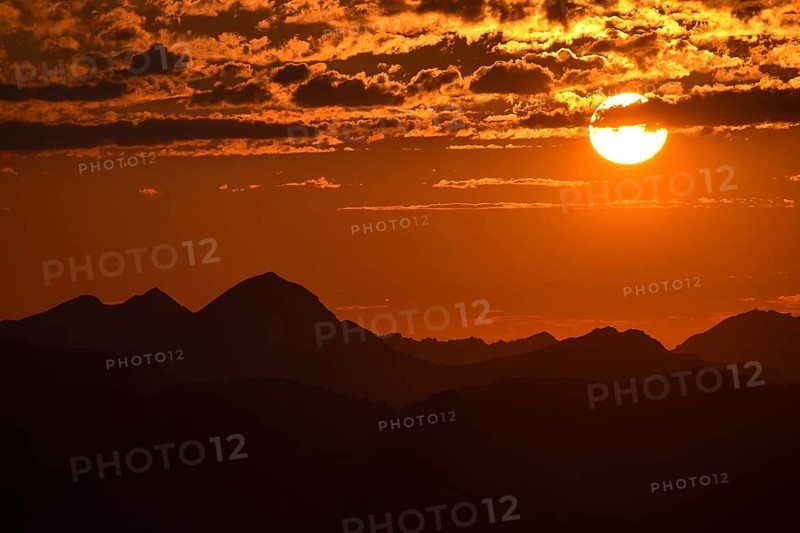 Sunset over the Chiemgau Alps with Sonntagshorn on the left and Hochfelln on the right, Bavaria, Germany