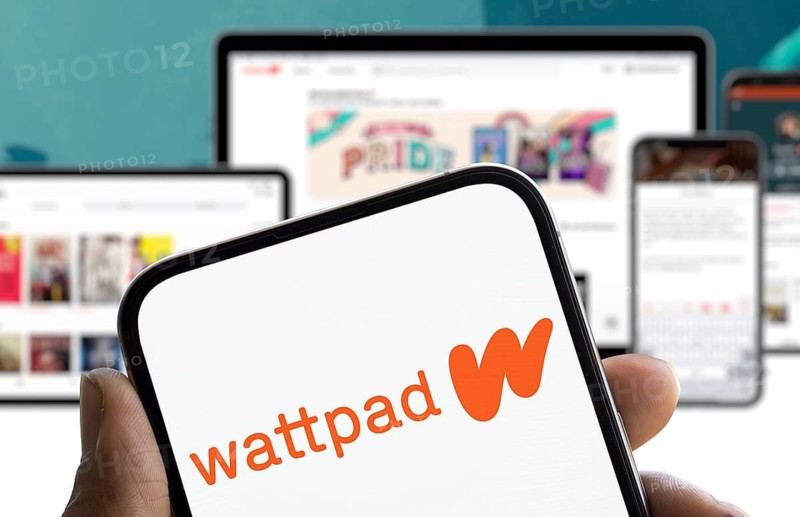 wattpad logo is displayed on smartphone. Wattpad is a platform for sharing stories and connecting with the writing community