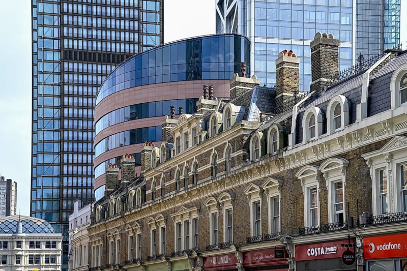 19th century Victorian row of houses in front of the Broadgate district office towers, Liverpool Street Station, City of London, London, England, Great Britain, Great Britain