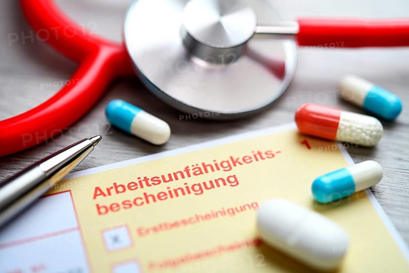 Certificate of incapacity for work with tablets and stethoscope, symbolic photo sick leave +++ editorial use only