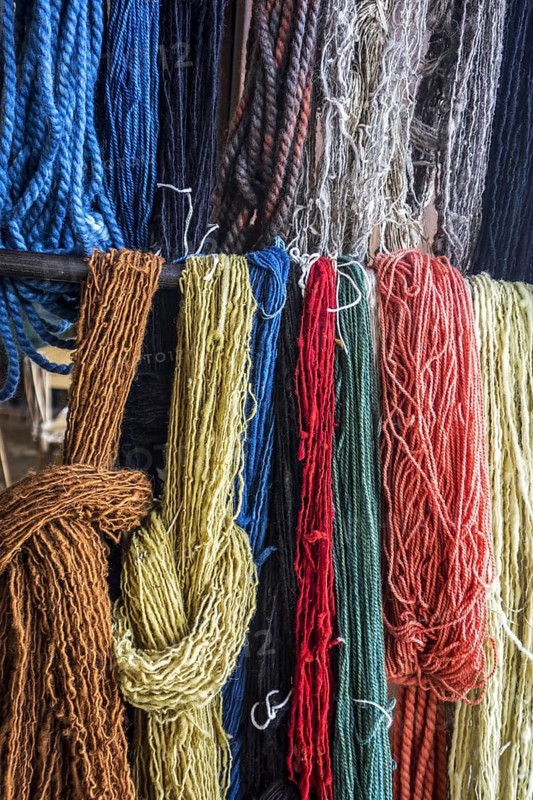 Coloured strands of dyed wool for weaving clothes