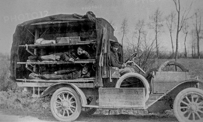 1914 Belgian ambulance for transporting laying wounded WWI soldiers during World War One in West Flanders, Belgium