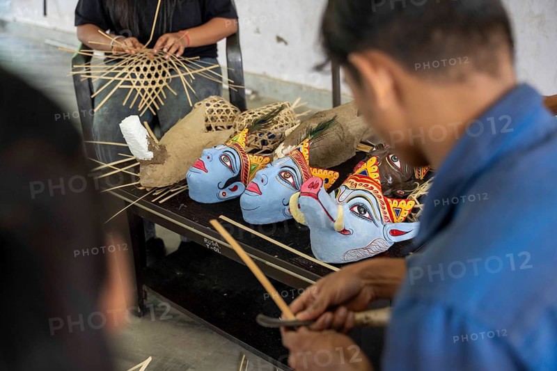 Students participate in a traditional mask-making workshop during an internship programme at J.D.S.G. College on Wednesday 8 July 2026 at Bokakhat, in Golaghat district of Assam. Under the guidance of artisan Khagen Goswami from Sukumar Kala Peeth, Majuli, participants are trained in the traditional mask-making techniques of Majuli's centuries-old Sattriya cultural heritage