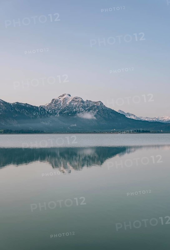 Frosty morning atmosphere during sunrise at Lake Hopfensee in the Allgäu in Bavaria, Germany