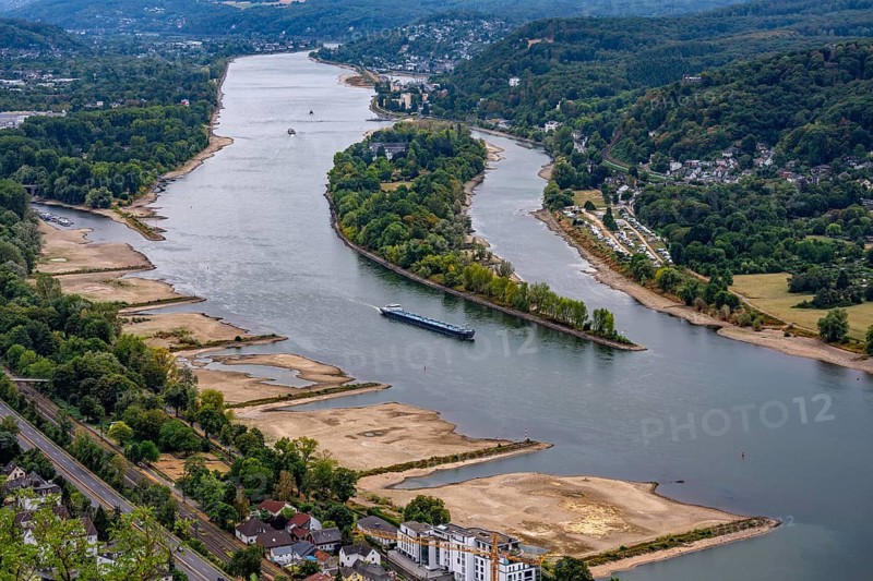 Low tide in the Rhine, view of the banks of the Rhine near Bad Honnef Rhöndorf from Drachenfels, Nonnenwerth island, large sandbanks, hardly any shipping traffic, freighters may only sail with significantly reduced load and reduced speed, North Rhine-Westphalia, Germany