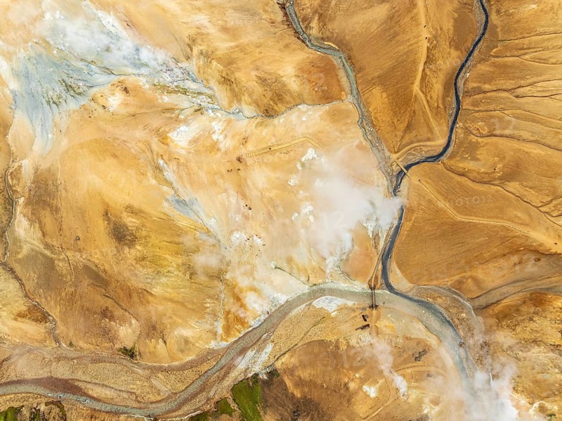 Steaming hot springs and colourful rhyolite mountains, aerial view, Hveradalir geothermal area, Kerlingarfjöll, Icelandic highlands, Iceland