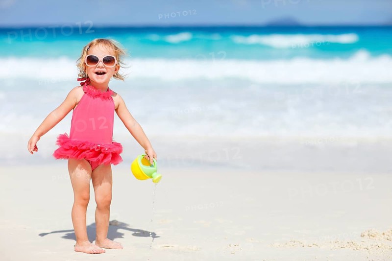 Seychelles, La Digue, Indian Ocean, a little girl playing on the beach, La Digue, Indian Ocean, Seychelles