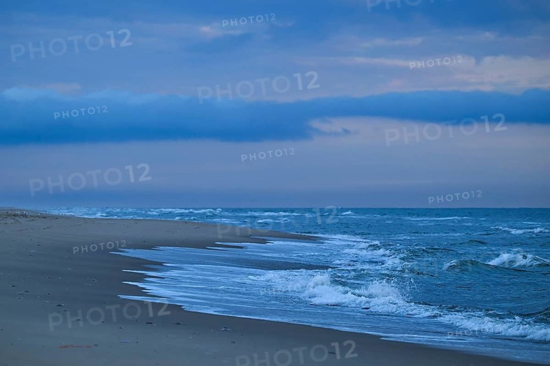 Surf, waves, blue hour after sunset, Houvig Beach, North Sea, Denmark