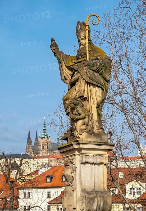 Statue of Augustine of Hippo with the Prague Castle, Charles Bridge, Praha, Czech Republic