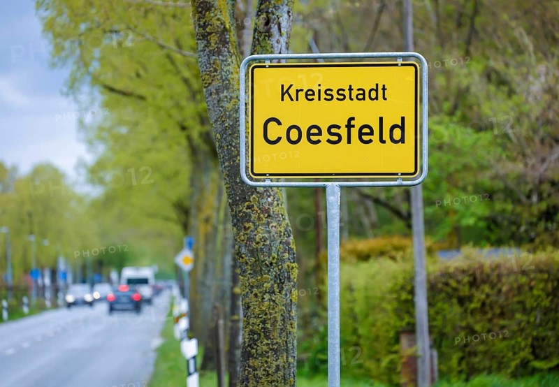 Coesfeld, North Rhine-Westphalia, Germany - Place name sign in times of the corona pandemic, Coesfeld district starts as a model region in North Rhine-Westphalia with relaxations