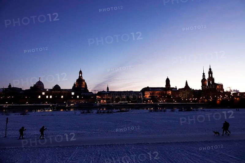 Dresden on a winter evening, Elbe, Church of Our Lady, Palace and Court Church, Saxony, Germany