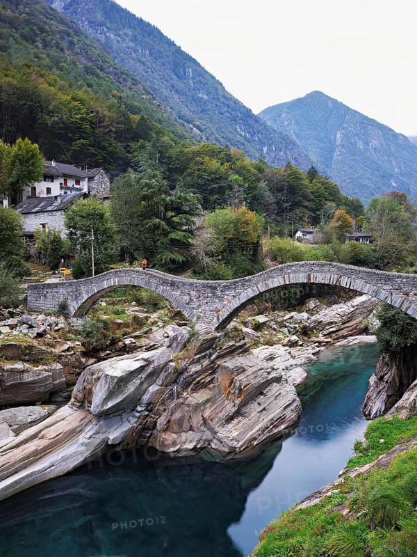 Historic Ponte dei Salti with double arches, Roman bridge, over the Verzasca river, Verzasca Valley, Lavertezzo, Canton Ticino, Switzerland