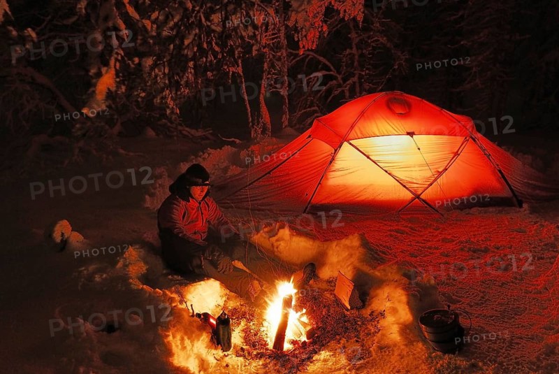 Bivouac, tent, illuminated, man around a campfire, Lapland, Sweden, Scandinavia