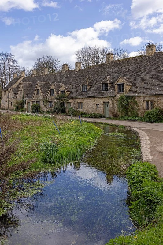 Houses, Arlington Row, Moat, Cotswold Stone, Bibury, The Cotswolds, England, Great Britain