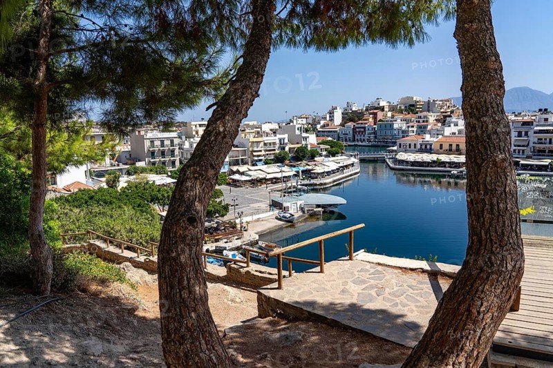 The village of Agios Nikolaos, in the eastern part of Crete, view over Lake Voulismeni, connected to the sea, old town, Greece