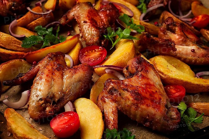 Fried chicken wings, with potatoes, and spices, homemade, fast food, no people