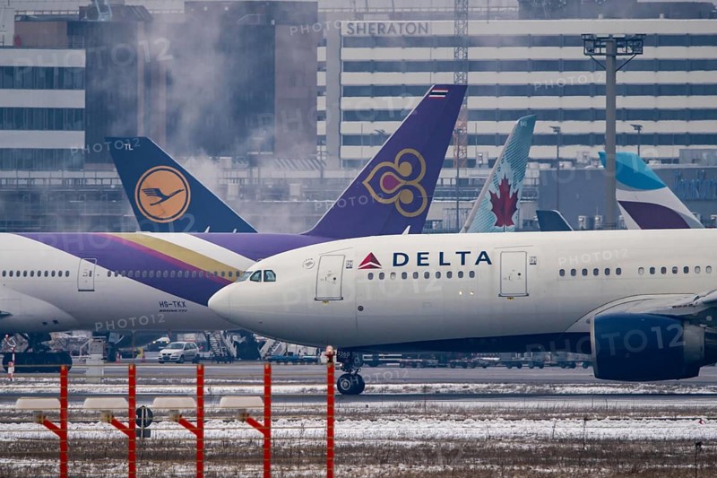 Aircraft on the taxiway at Frankfurt FRA airport, Fraport, in winter, Hesse, Germany