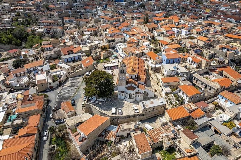 Town view Pano Lefkara with the church Timiou Stavrou seen from the air, Cyprus