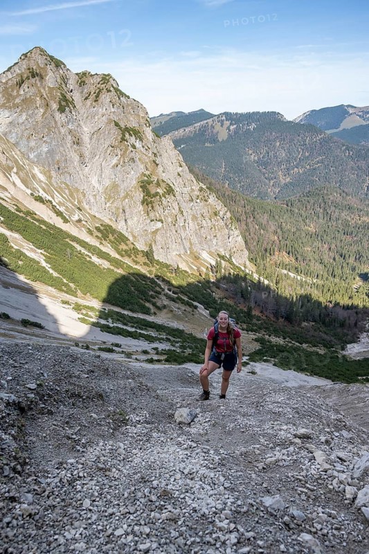 Mountaineer in a steep scree cirque, hiking trail to the Bavarian Schinder, Bavarian Prealps, Mangfall mountains, Bavaria, Germany