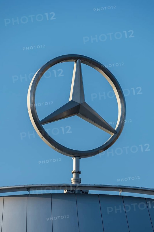Mercedes symbol on a building under a blue sky, Mercedes star, Stuttgart-Untertürkheim, Baden-Württemberg, Germany