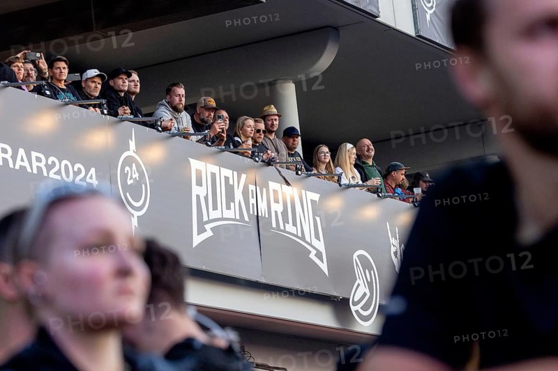 Adenau, Germany, 7 June 2024: Fans on the grandstand at Rock am Ring. The festival takes place at the Nürburgring race track near the town of Adenau from 7 to 9 June 2024