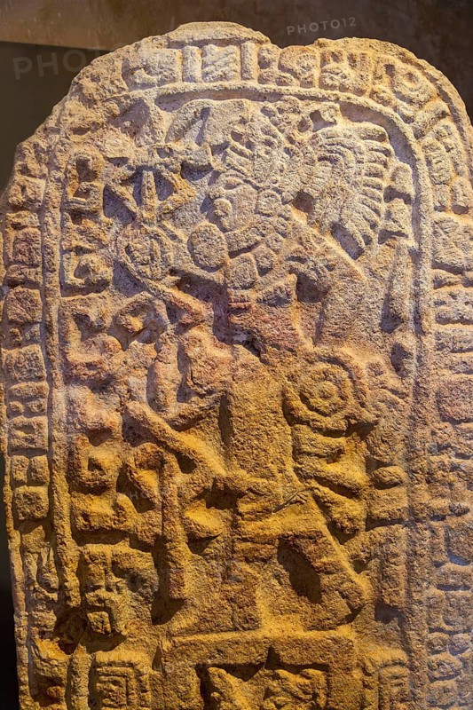 Stela carved image of warrior with spear and shield, museum of Mayan Archaeology, Campeche city, Mexico