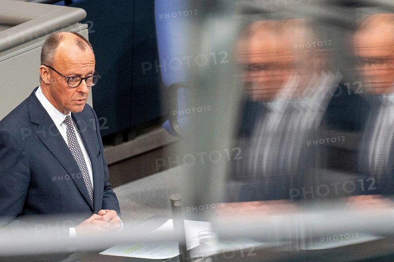 Berlin, Germany - 18 March 2025: Friedrich Merz, CDU Chairman and Chancellor-designate, speaks in the Bundestag in front of the vote on reforming the debt brake to allow hundreds of billions of euros to be borrowed for defence, infrastructure and climate protection, which requires a two-thirds majority of MPs to amend the Basic Law. The SPD and CDU/CSU had introduced the bill to amend the Basic Law in special sessions in the old Bundestag and put it to the vote due to different majorities in the new Bundestag, which will be constituted next week