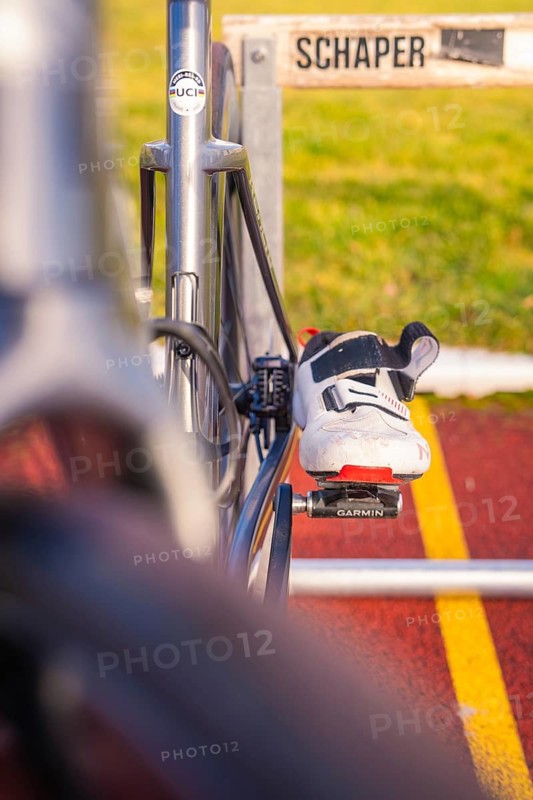 Close-up of a racing bike with a shoe on the pedal on a racetrack, triathlon bike, Calw, Germany