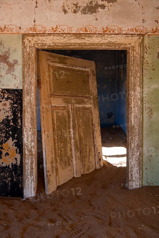Interior view, doors and house full of sand, former diamond mining town, Namib Desert, Kolmanskop, Karas, Namibia