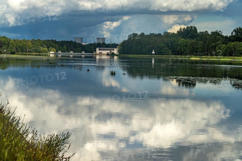 Clouds reflected in the Danube reservoir Faimingen, Lauingen Donau, Bavaria, Germany