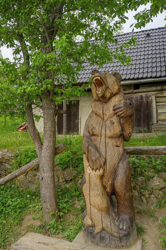Wooden bear statue, Vlkolinec village, Unesco World Heritage Site, Ružomberok, Žilinský kraj, Slovakia