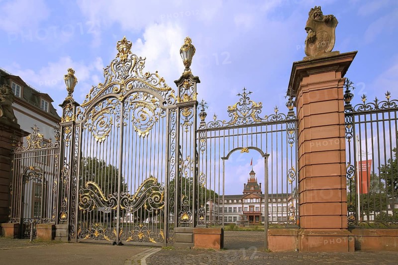 Magnificent golden metal gate with decorations, metal bars, ironwork, baroque Philippsruhe Castle, Kesselstadt, Hanau, Hesse, Germany