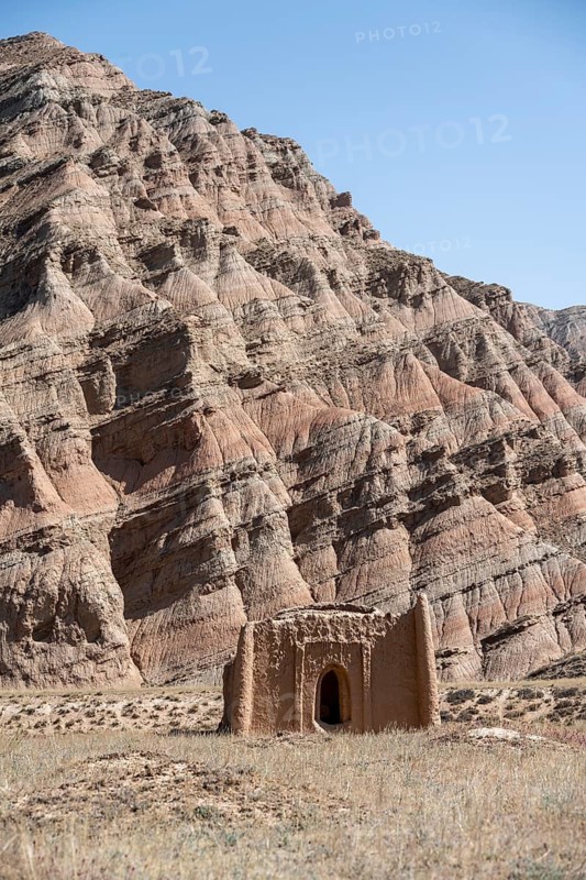 Ancient mausoleum, erosion landscape, Naryn province, Kyrgyzstan