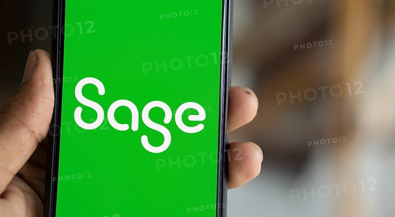 Sage Group logo is displayed on smartphone. Sage Group plc is a British software company