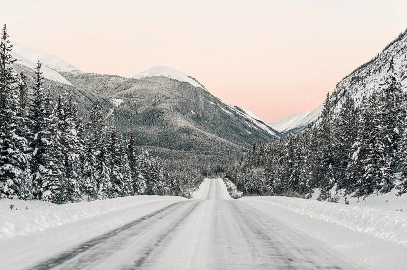 Winter road trip on the Icefields Parkway with lots of snow and ice, Banff National Park, Jasper National Park, Alberta, Canada