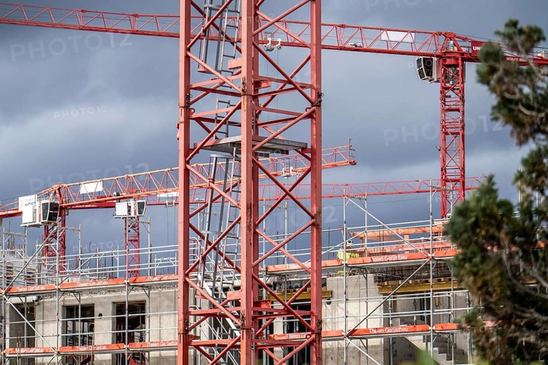 Major construction site in Düsseldorf, on the B8, Danziger Straße, construction of a residential and commercial complex, Deiker Höfe, construction cranes, North Rhine-Westphalia, Germany
