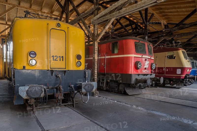 International locomotives, from left to right: Dutch electric locomotive 1211, two-frequency locomotive of the ÖBB, 1957, electric locomotive of the DB AG, class 120, 1979 in the Rundhaus Europa im Bahnpark, Augsburg, Swabia, Bavaria, Germany
