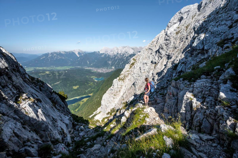 Climber on the ascent to the Westliche Wettersteinspitze, Wetterstein Mountains, Bavaria, Germany