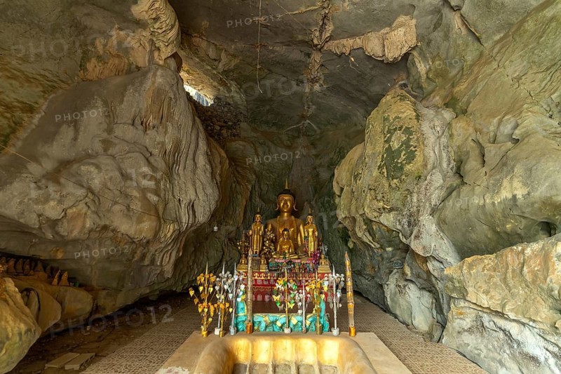 Buddha statue in the elephant cave Tham Xang near Vang Vieng, Laos