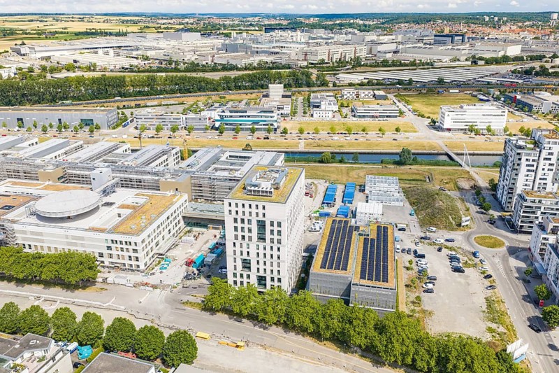 Extensive industrial area with modern buildings and a river, seen from above, new hospital building, Böblingen airfield, Germany