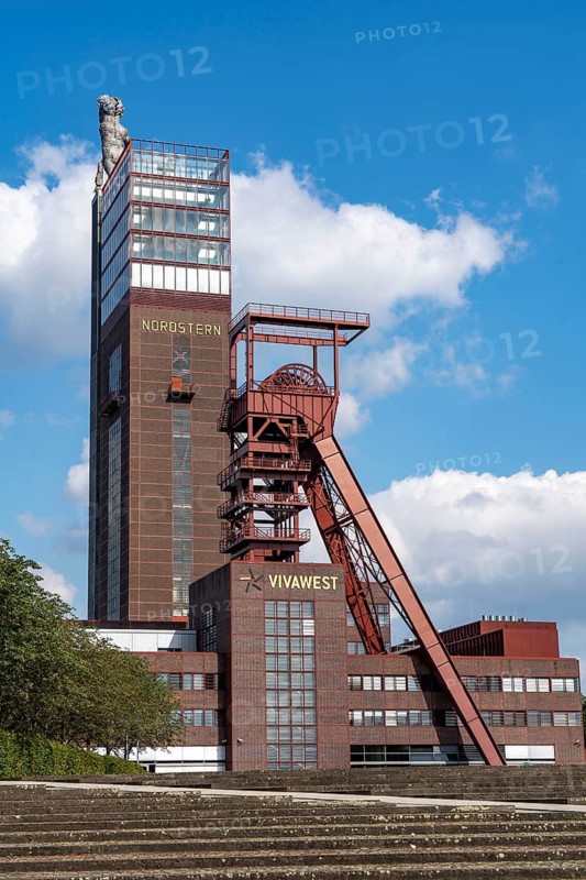 Nordsternpark, former site of Nordstern colliery, pithead tower, Nordstern tower, Hercules sculpture, headquarters of housing provider Vivawest in Gelsenkirchen, North Rhine-Westphalia, Germany