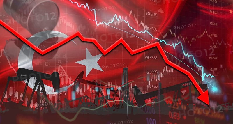 Fall oil price with Turkish flag on economic chart. Petrol crisis with Turkey flag on financial graph