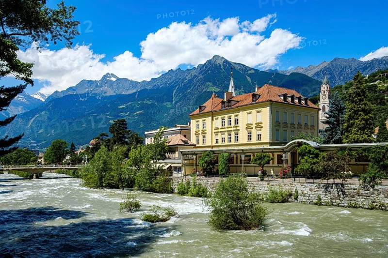 Passer and Passerufer with a view of the Passerpromenade and Wandelhalle, a historic spa architecture of the 19th century in Merano, South Tyrol, Italy