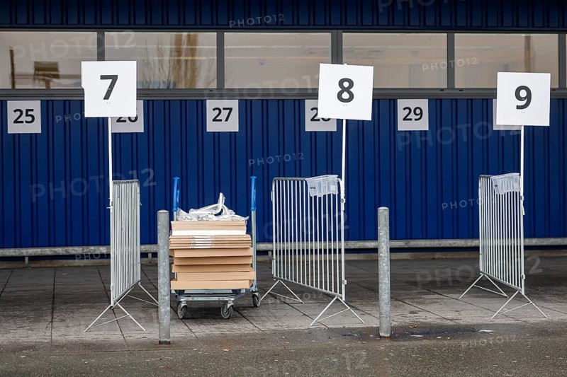 Duisburg, North Rhine-Westphalia, Germany - Click and Collect at Ikea, contactless shopping, employees place the ordered goods in pick-up boxes, after they have left, the customer can leave his car and pick up his goods