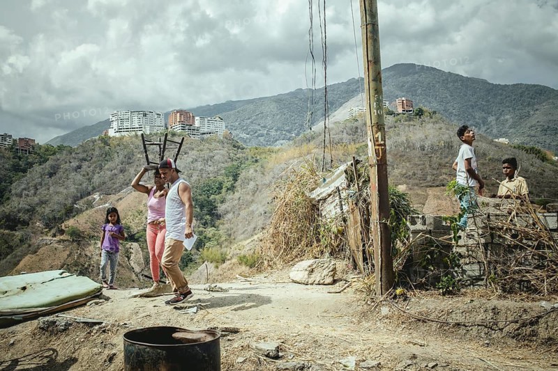 Victims after a major fire in the Petare slum, Caracas, Venezuela