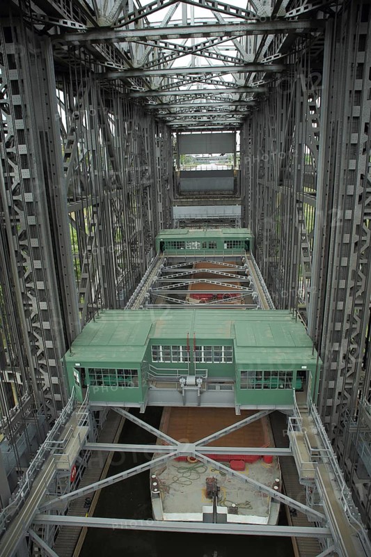 Cargo ship in the lock at the steel structure shipwreck, Niederfinow, Brandenburg, Germany