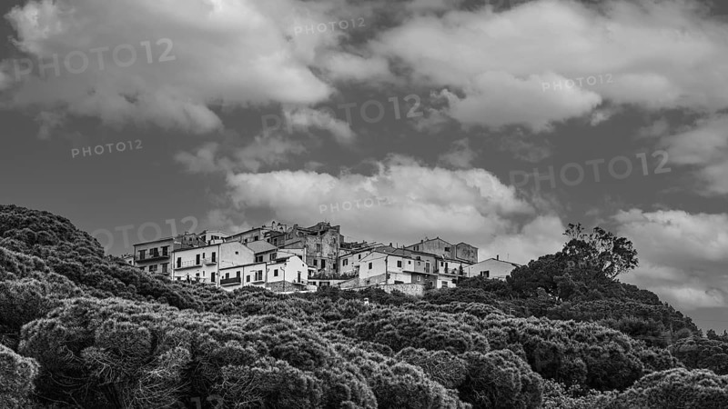 The village of Capoliveri, view from the beach della Madonna, black and white photograph, Elba Island, Tuscan Archipelago National Park, Tuscany, Italy