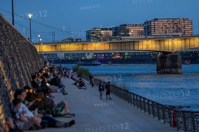 Severinsbrücke across the Rhine, crane houses, cargo ship, Rhine promenade on the Kennedy-Ufer, in Cologne-Deutz, North Rhine-Westphalia, Germany