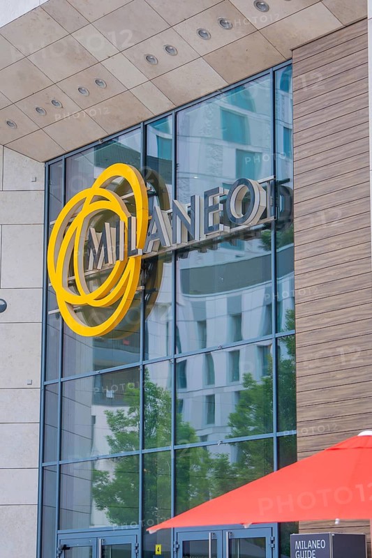 Exterior view of a building with Milaneo logo on a glass façade, Milaneo, Stuttgart, Germany