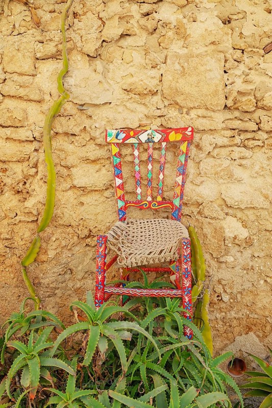 Artwork hanging on a wall, Marzamemi, Noto Valley, Sicily, Italy